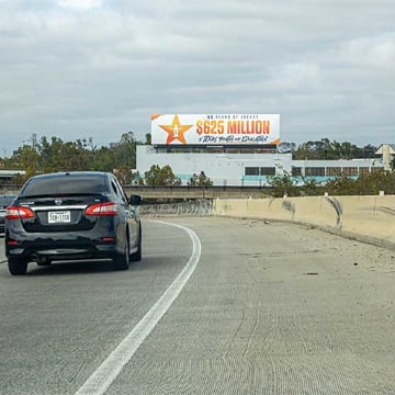 Houston Rodeo billboard alongside highway out of home advertising