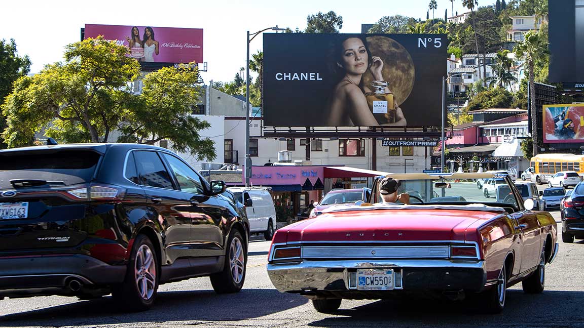 Chanel advertisement on OUTFRONT PRIME billboard on Sunset Strip in West Hollywood