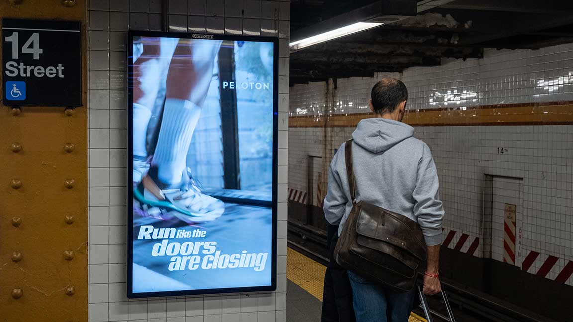 Contextually relevant Peleton ad on Liveboard in New York City subway