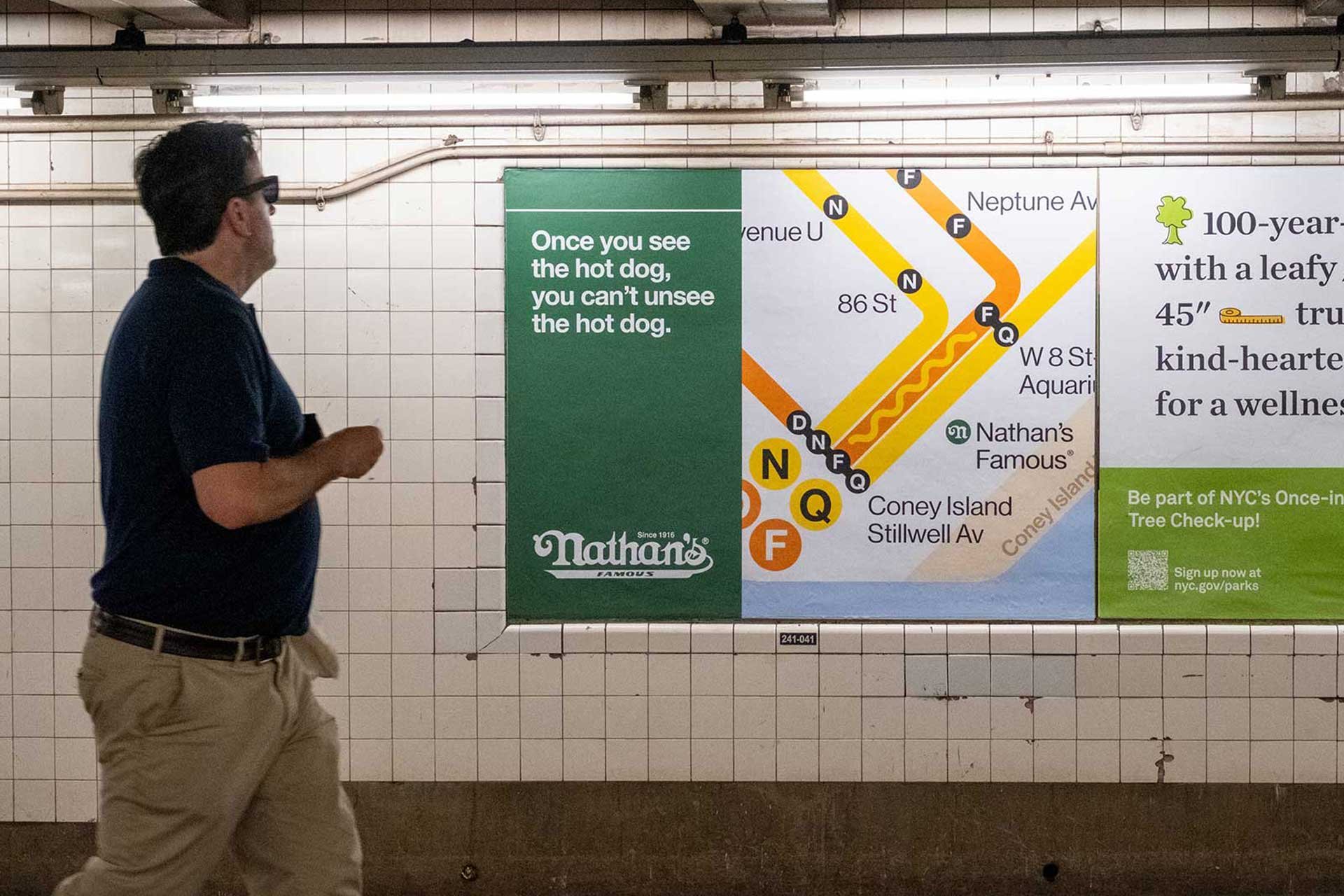 Nathan’s Famous ad that says “Once you see the hot dog, you can’t unsee it”. The hot dog is made by the N, F, and Q subway lines converging on the map right in front of the original Nathan’s Famous location on Coney Island.