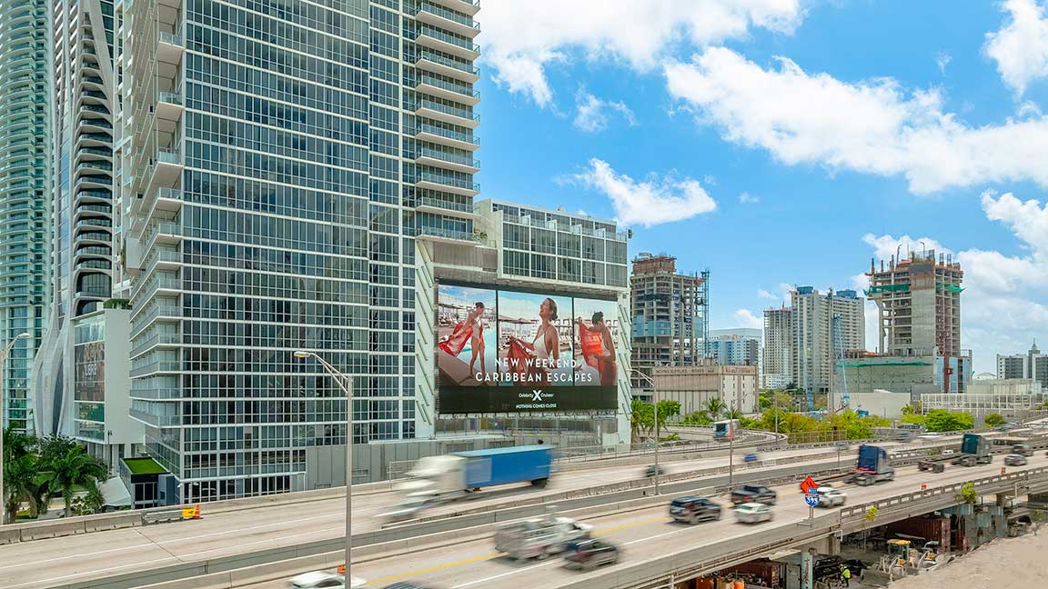 Celebrity Cruises advertisement on The Iconic, an OUTFRONT PRIME wallscape billboard overlooking I-395 at Biscayne Blvd. (U.S. 1) on PortMiami approach