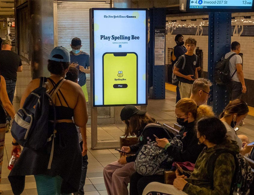 out of home transit subway advertising new york times spelling bee gaming