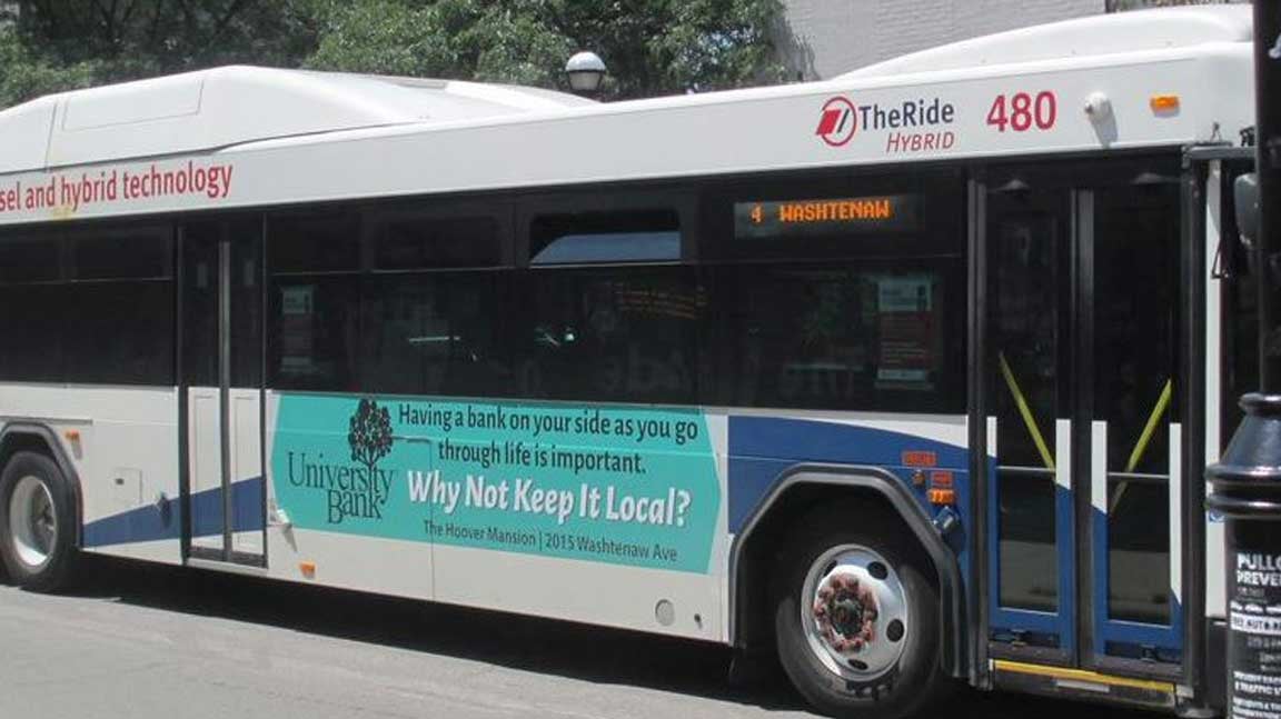out of home bus transit advertising university bank