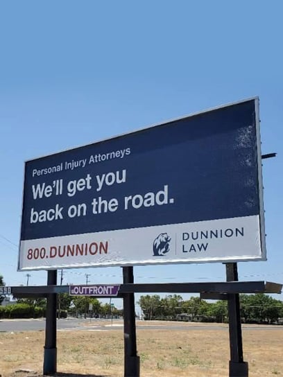 out of home advertising dunnion law group billboard