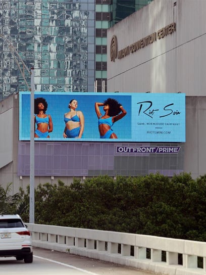 out of home advertising riot swim digital billboard