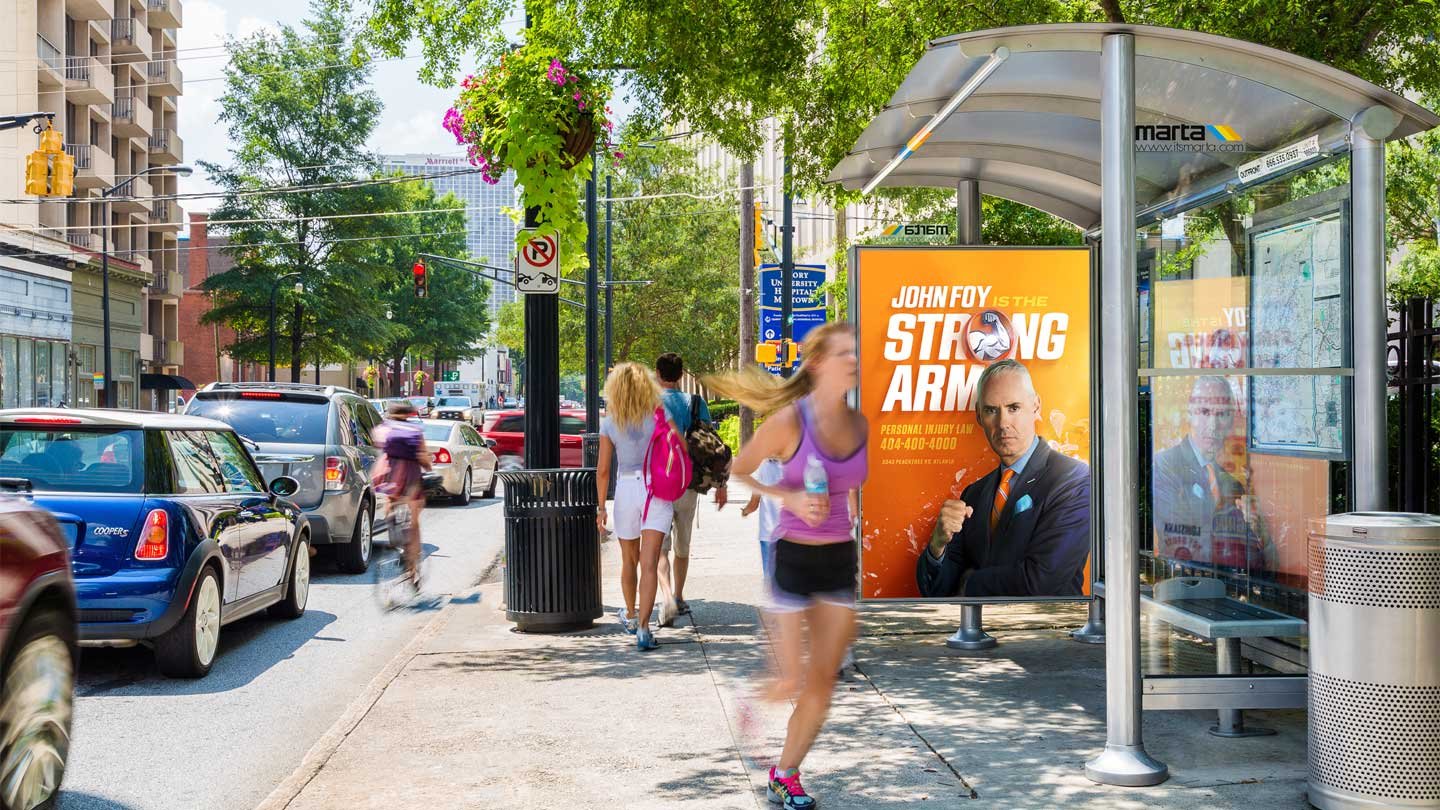 bus shelter out of home advertising in atlanta for john foy