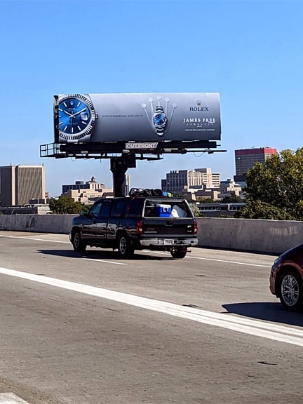 highway billboard out of home advertising for rolex watches