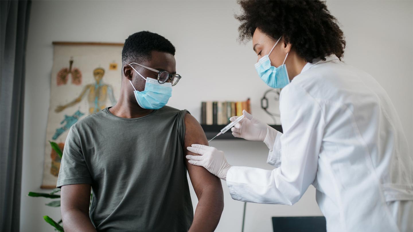 stock image of healthcare worker and patient
