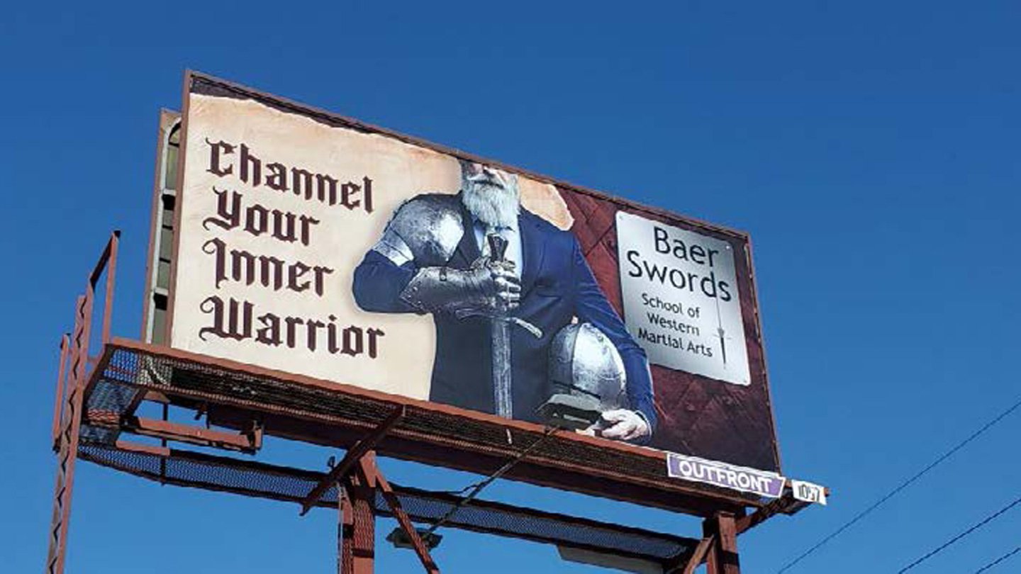 baer swords on poster out of home advertising in kansas city