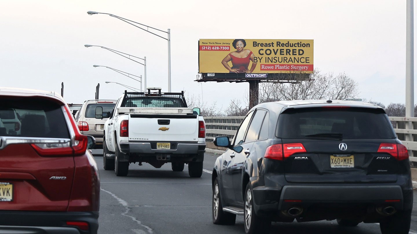 rowe plastic surgery on highway billboard out of home advertising in new jersey