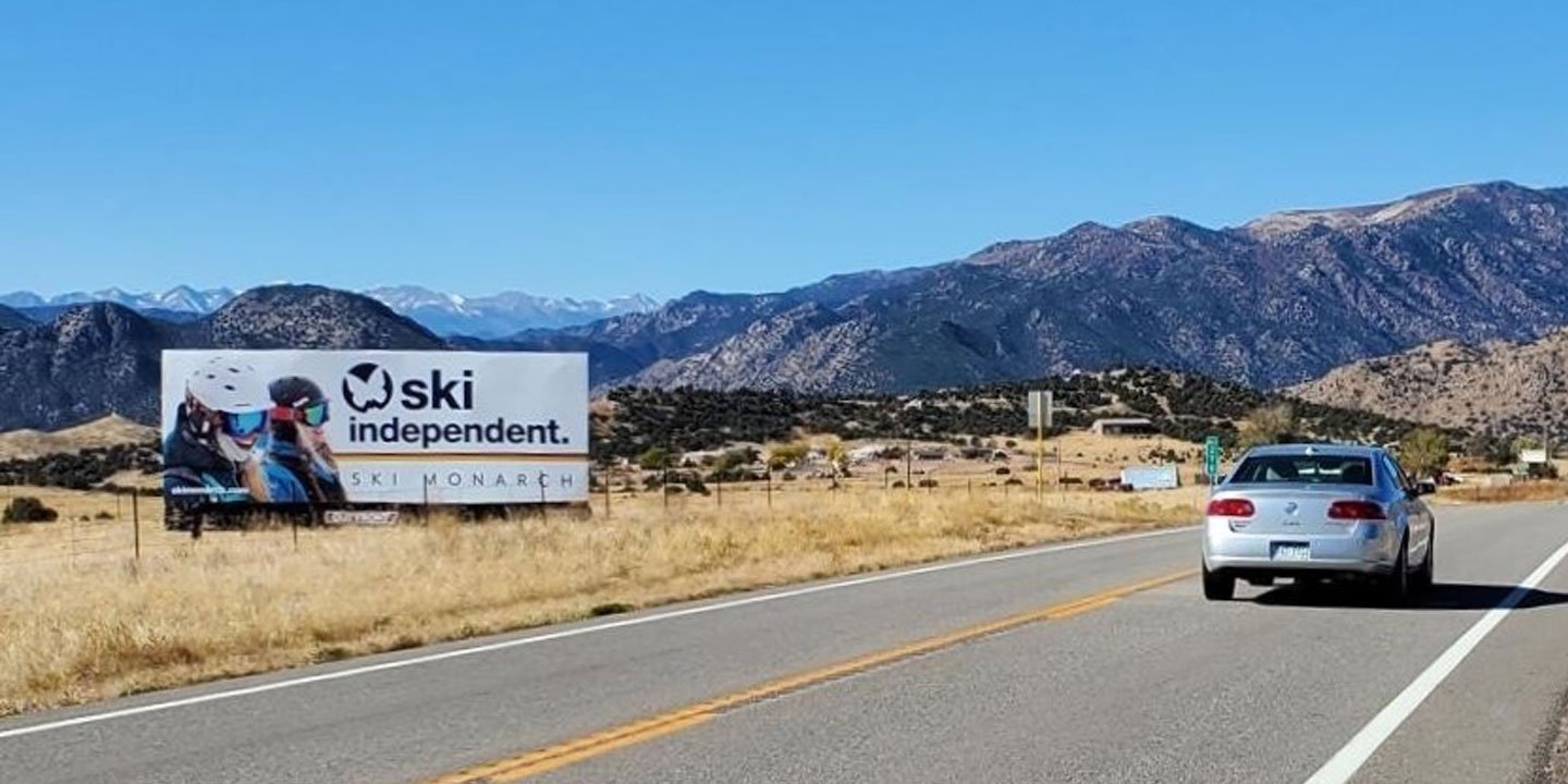 out of home billboard advertising in the rocky mountains for ski monarch