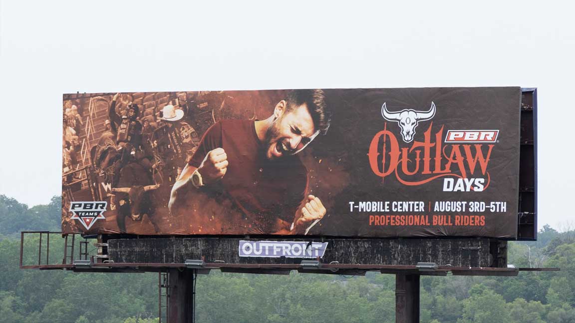 PBR Teams Outlaw Days billboard in Kansas City with excited man