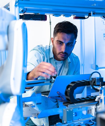 A man working in a medical device lab