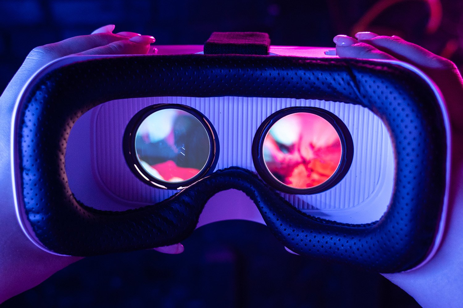 POV of an individual putting on virtual reality glasses, ready to dive into immersive technology, ranked Inc-5000
