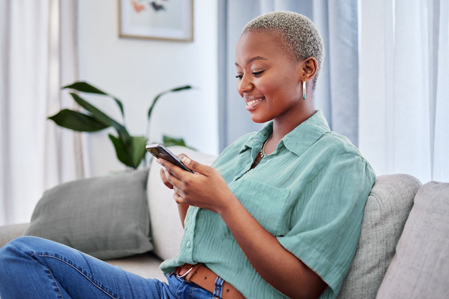 A woman looking at something on her phone