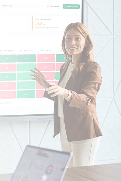 Woman presenting data to colleagues