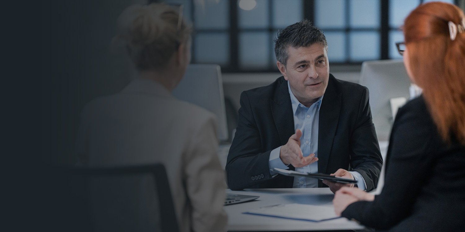 A group of professionals in a meeting