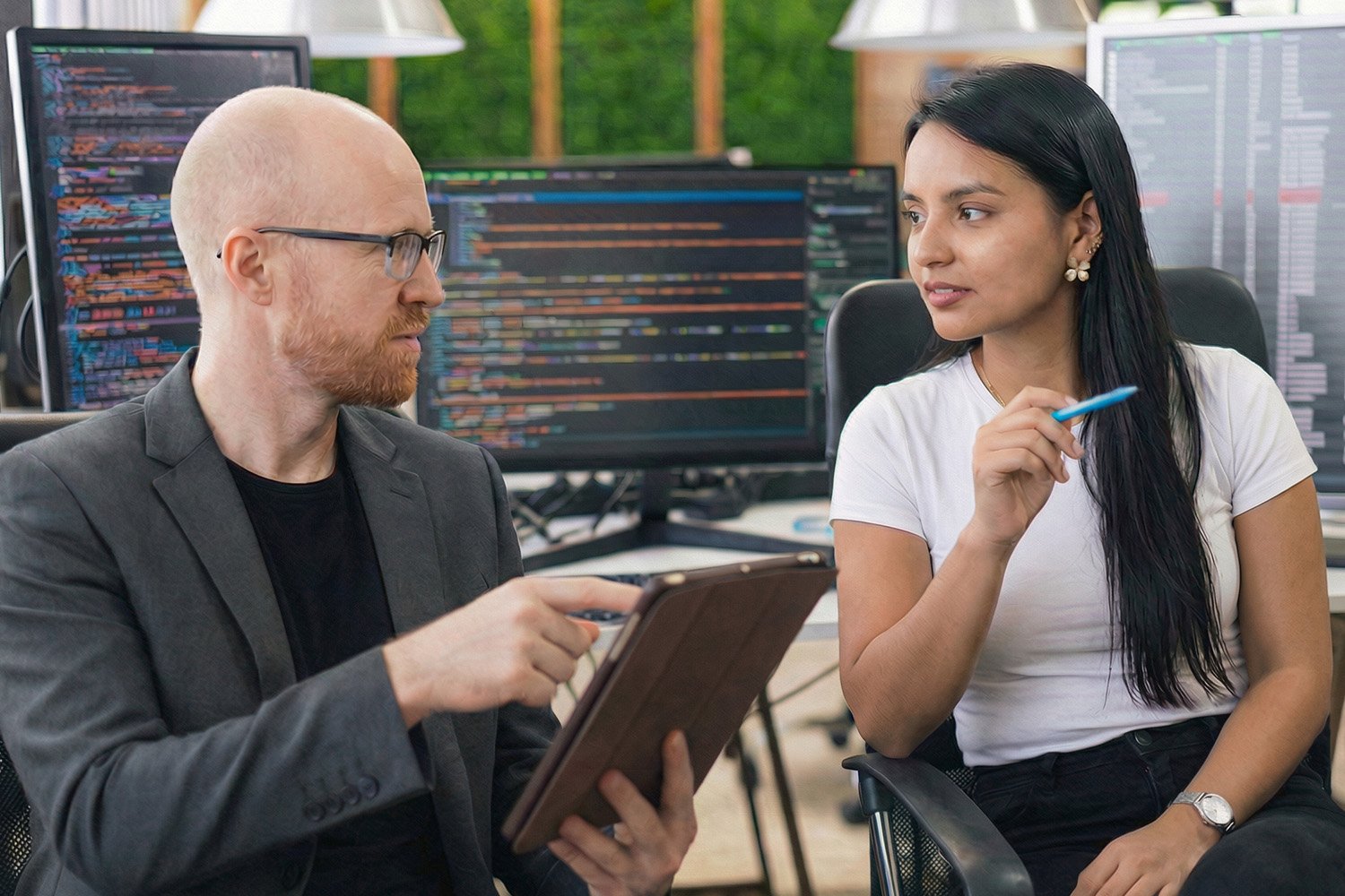 colleagues discussing development work