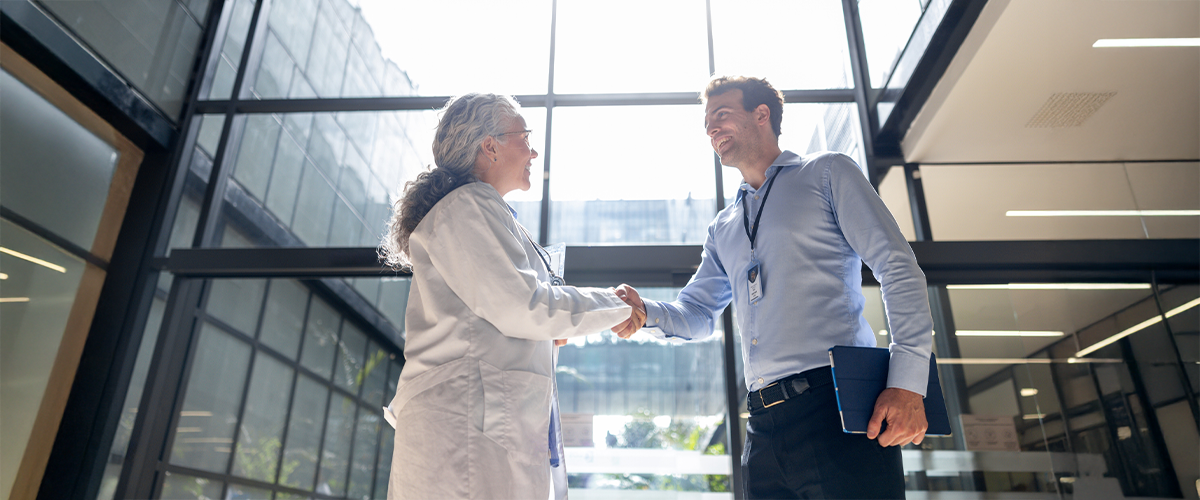 healthcare professionals shaking hands