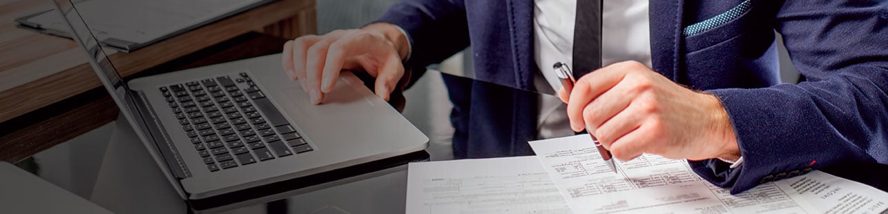 Man filling out forms