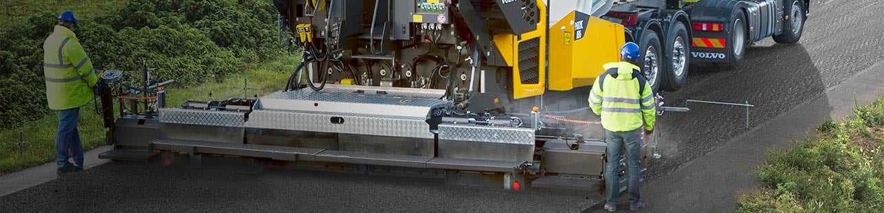 Truck smoothing road asphalt