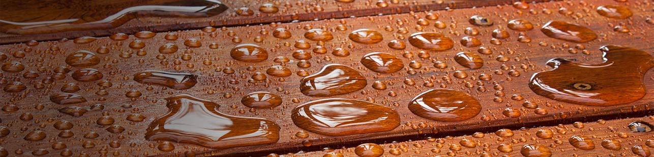 Water beading on wood deck