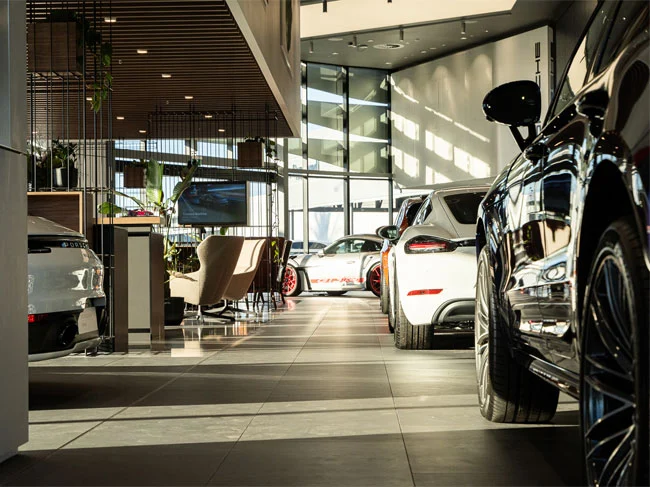 Porsche Centre showroom with multiple Porsche Cars on display