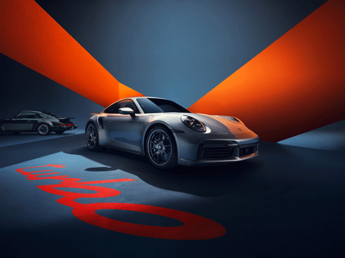 Porsche 911 Turbo 50 Years next to classic model