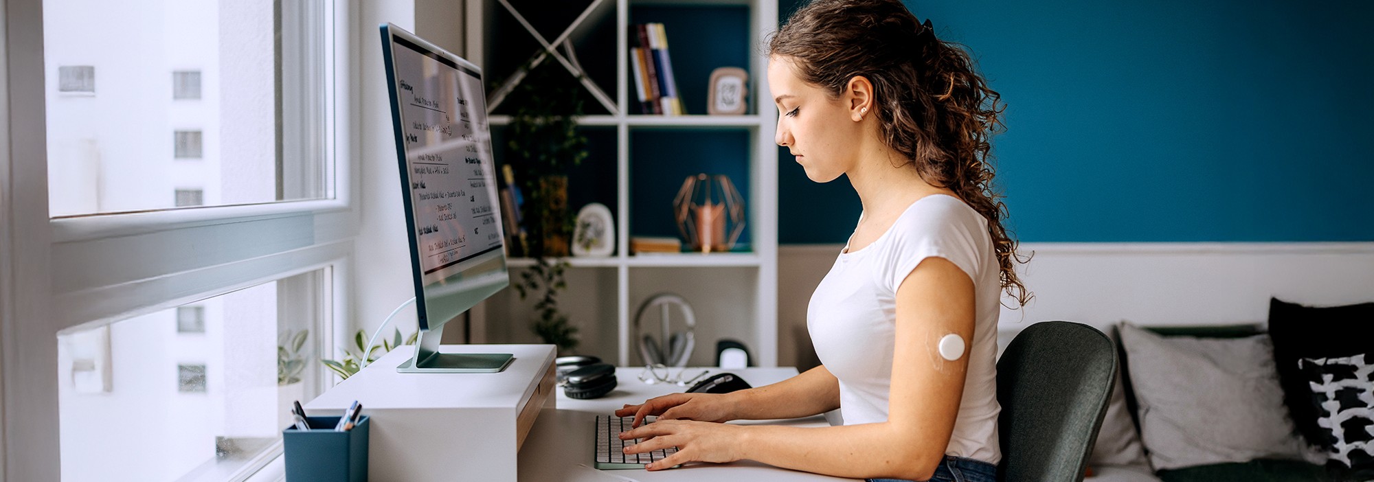 Woman working on computer at the desk