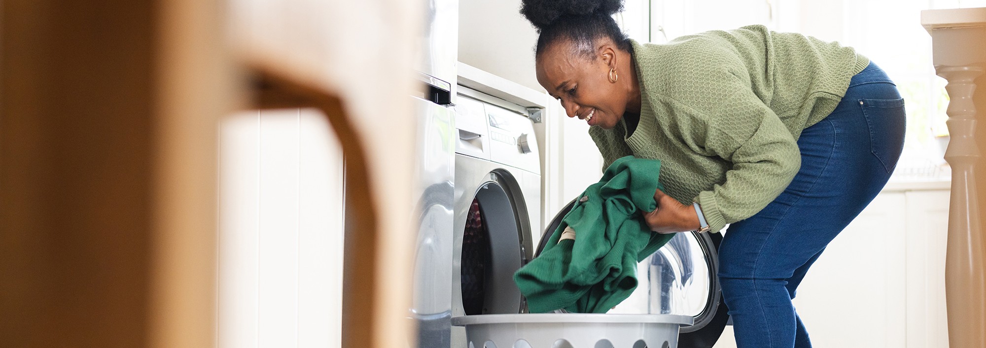 Woman unloading laundry
