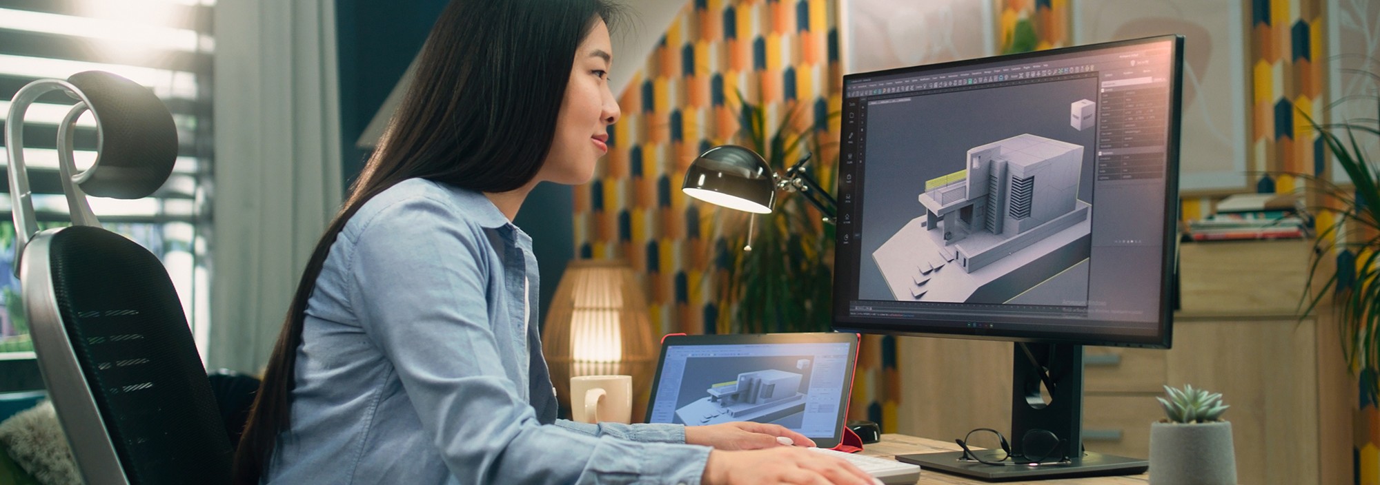 Woman working on desktop computer