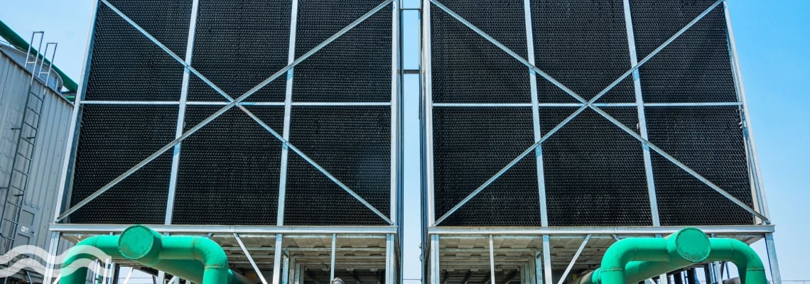 A photo of two cooling towers at a data centre