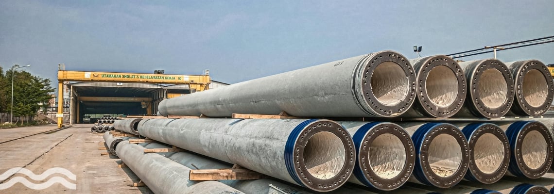 Stacks of concrete sewer pipes
