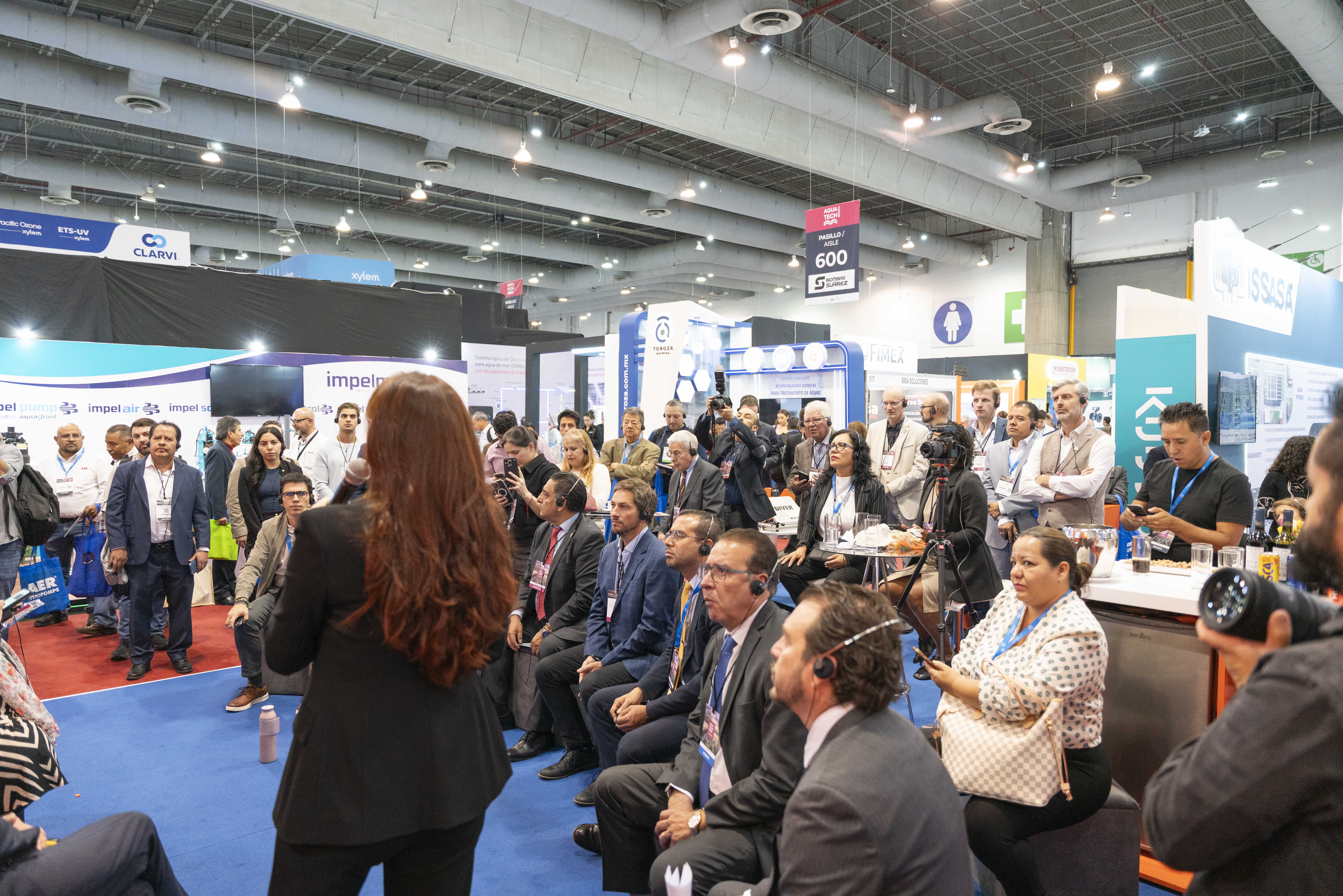 Visitors exploring the Aquatech Mexico exhibition floor
