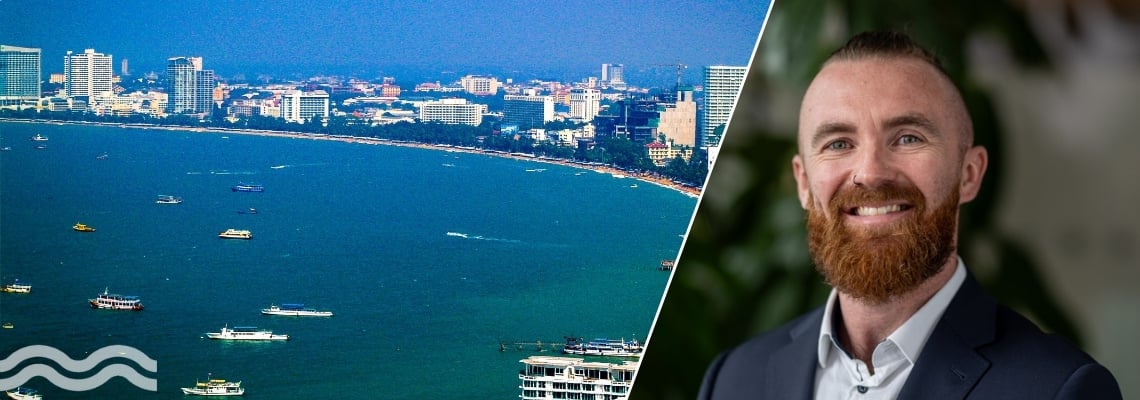 Author John Ferguson, regional manager of Danfoss WITH Pattaya City Beach view, Thailand