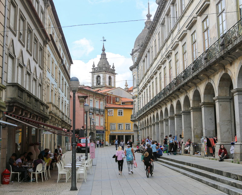 Street view of Braga with people walking in public square
