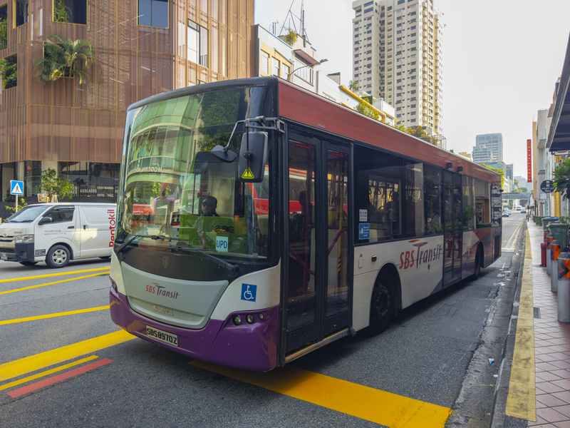 SBS Transit city bus in Singapore, illustrating off-peak travel nudges and lotteries