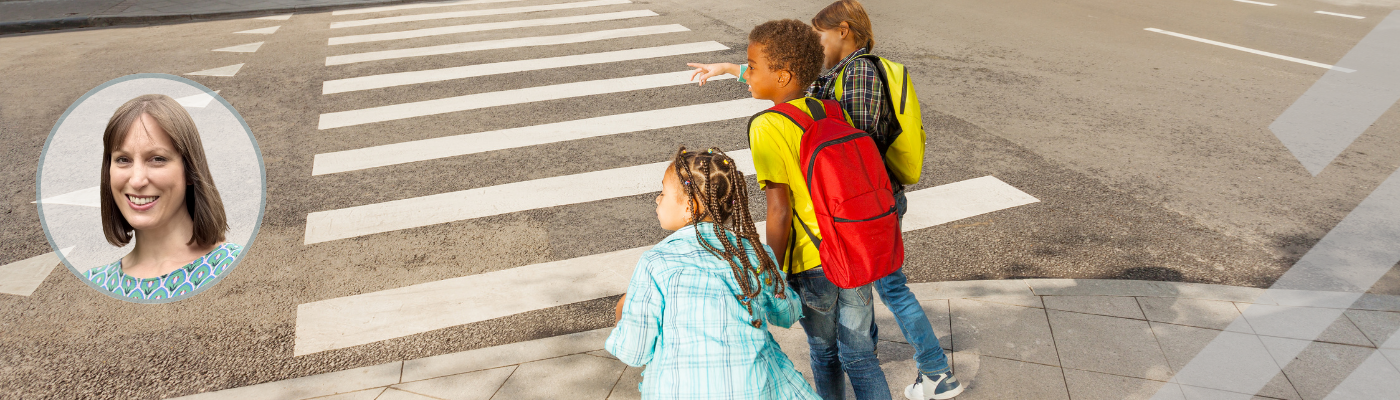 Children crossing road on pedestrian crossing