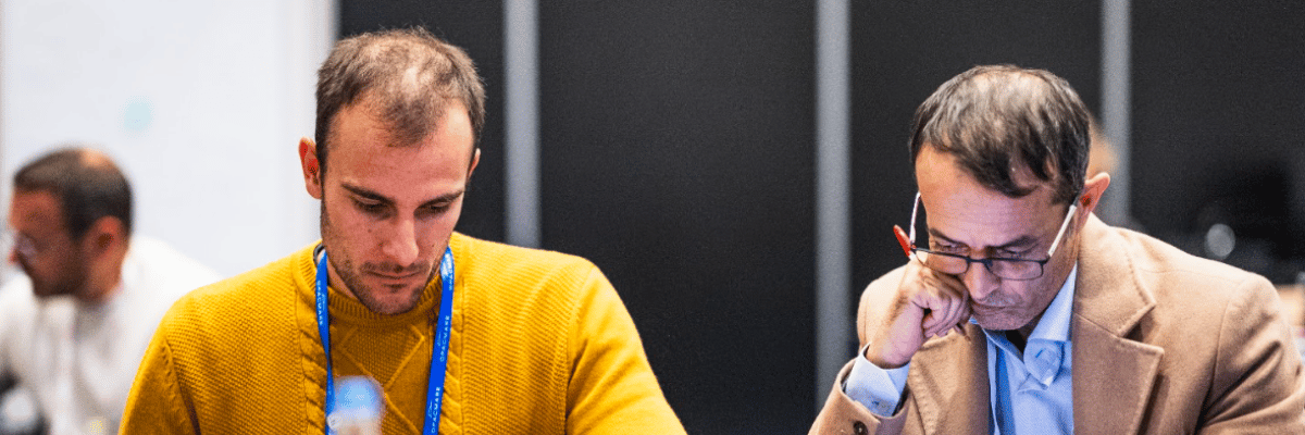 Two attendees speaking during a Marine Impact Lab session at Metstrade.