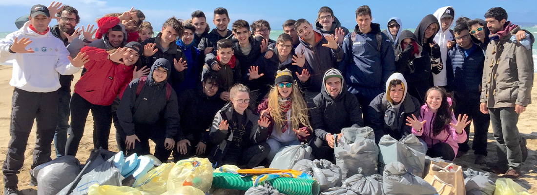 Group photo of Save The Med Foundation team members, volunteers and supporters working together to protect and restore Mediterranean marine ecosystems.