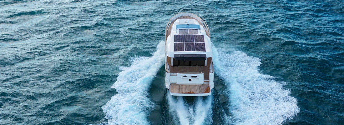 Greenline Yachts motor yacht cruising on open water, demonstrating efficient and sustainable boating technology.