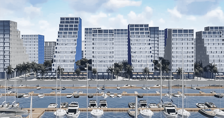 Marina filled with sailing yachts and motorboats moored along floating docks.