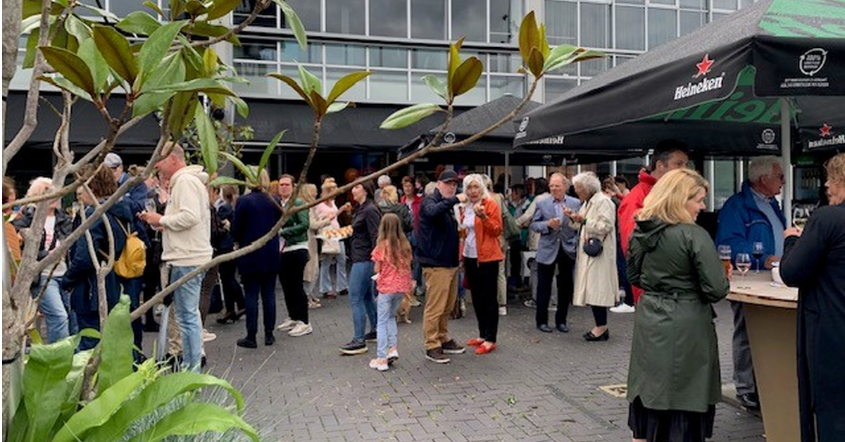 Neighbours of the RAI are having drinks in front of Grand café during the neighbourhood gathering organised by RAI Amsterdam