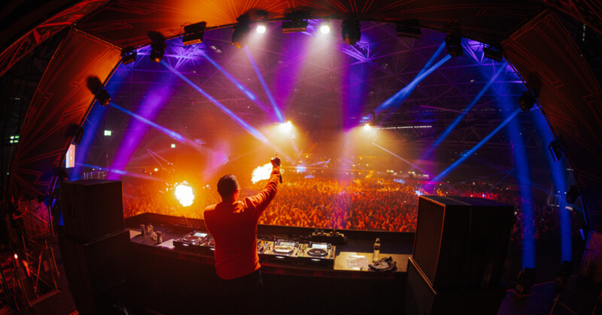 Photo of stage with artist and audience during Kingsland 