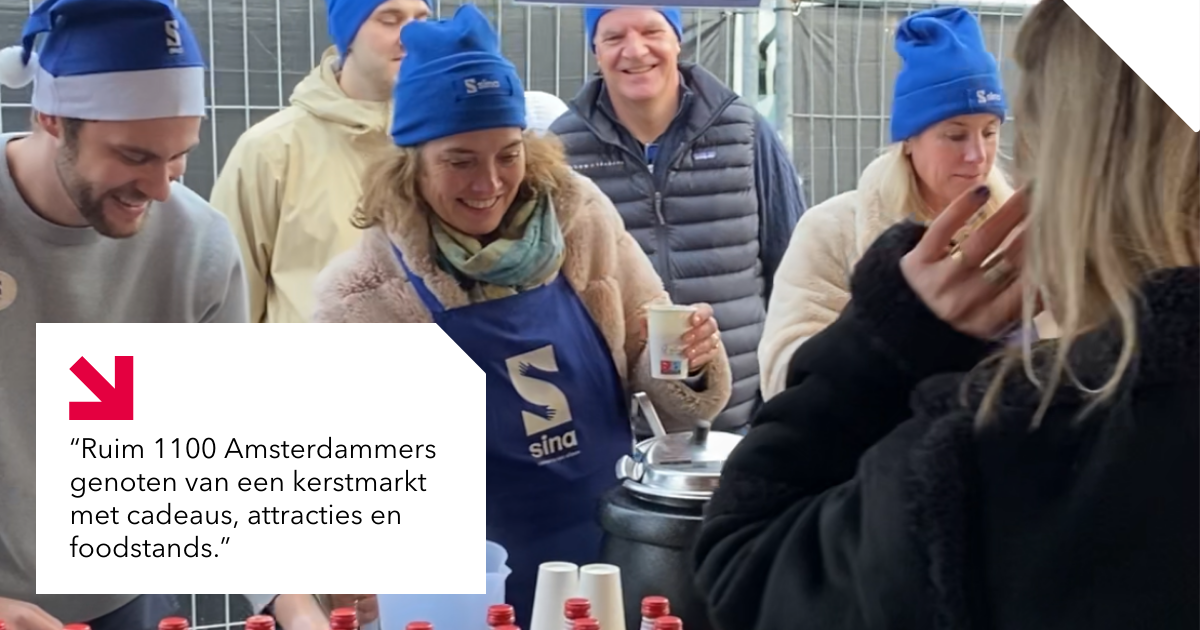 Foto van vrijwilligers tijdens SINA kerstmarkt 