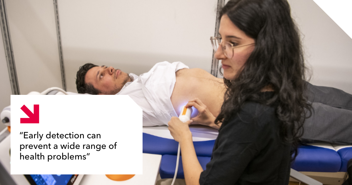 A man has his liver screened by a medical professional