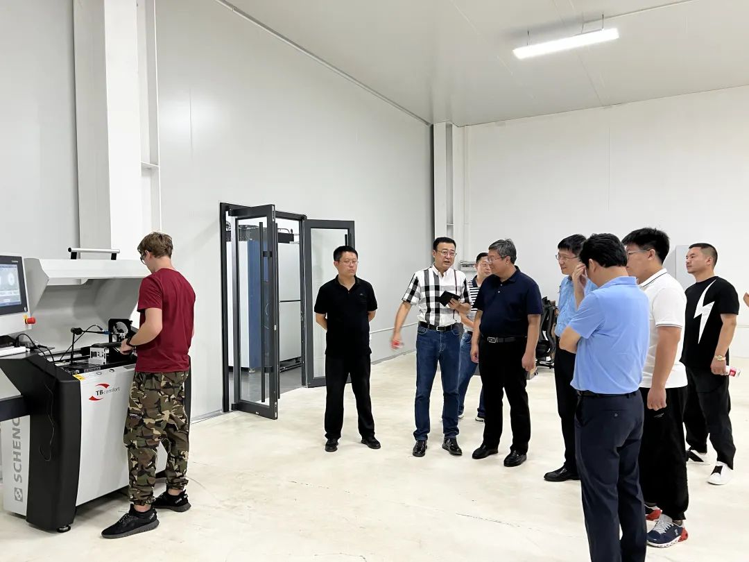 Turbotec employee showcasing the machine