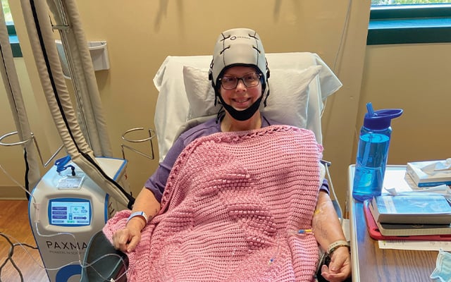 A Reid Health patient using the cooling cap technology 