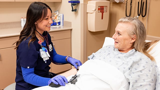 A Reid Health Nurse providing care to a patient in the emergency room