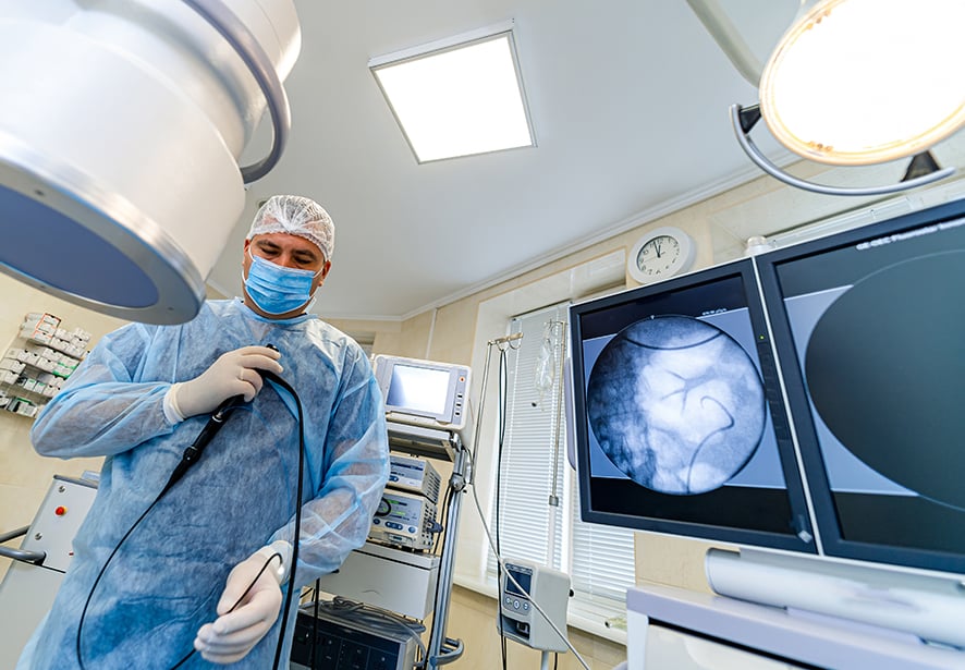 A provider setting up for a coloscopy 
